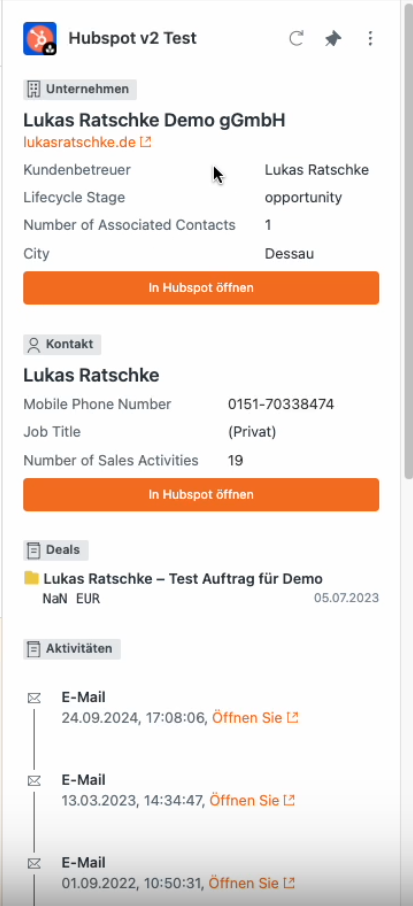 HubSpot app panel in Zendesk showing company, contact, deal, and email activities with an Open in HubSpot button